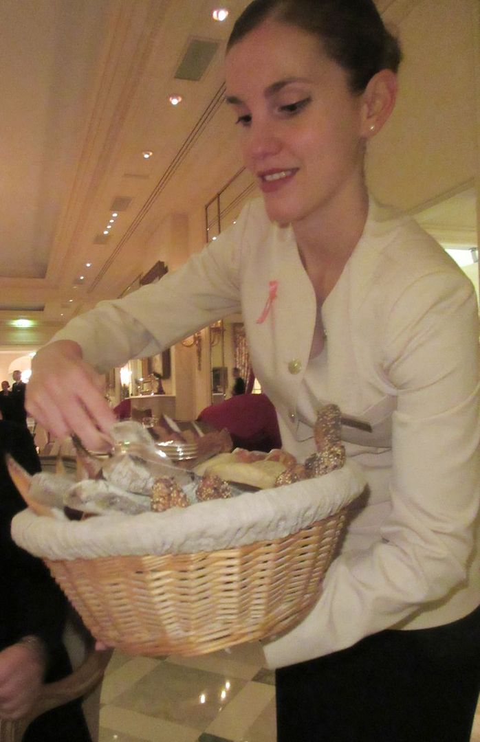 Epicure’s 3 Star Servers are smartly dressed in white jackets, the women with hair in buns.