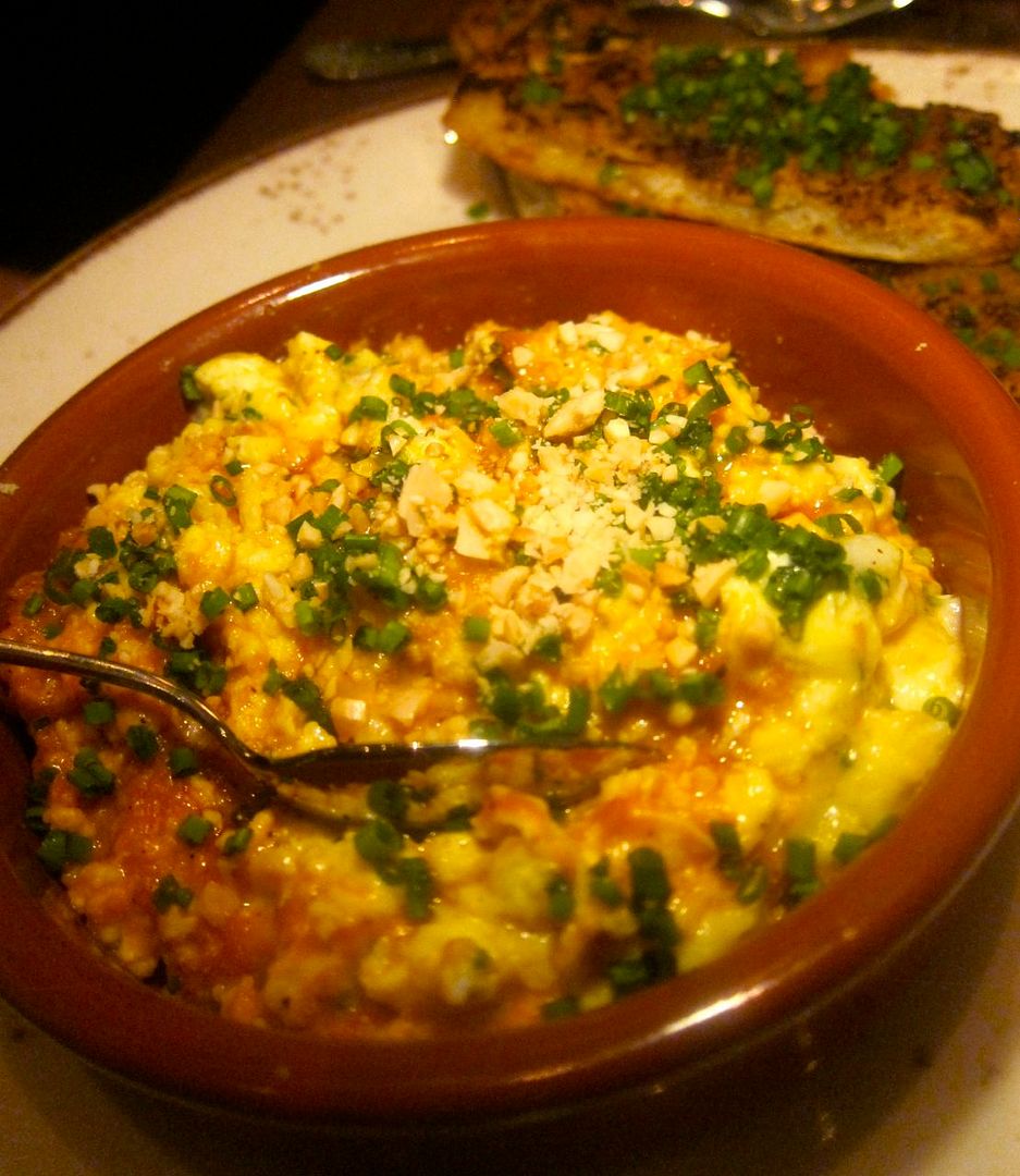My must-have is the marvelous scrambled eggs with romesco to pile on tomatgo confit toast. 