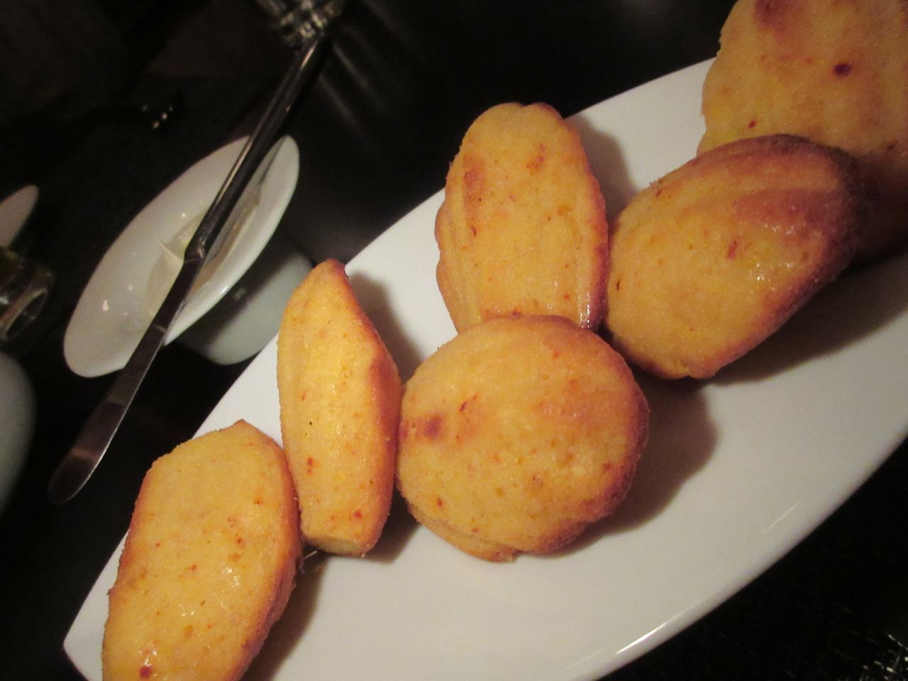 The revolving chef concept at Lettuce Entertain You’s Intro in Chicago provokes corn madeleines.